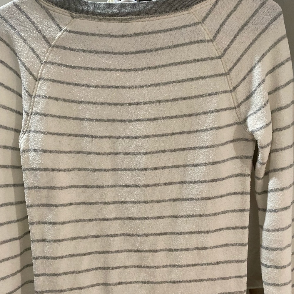 Pink brand sweater. Sweater is well kept, colors are grey and white stripes.